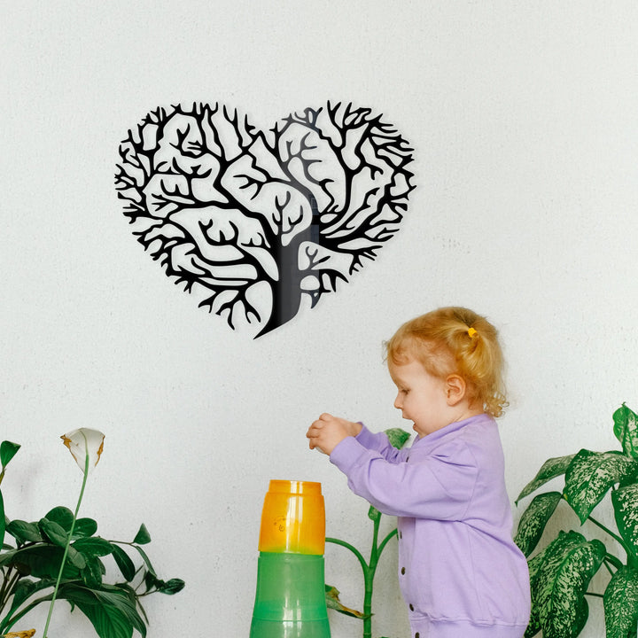 Metal wall decor of a tree of life cut into a heart shape