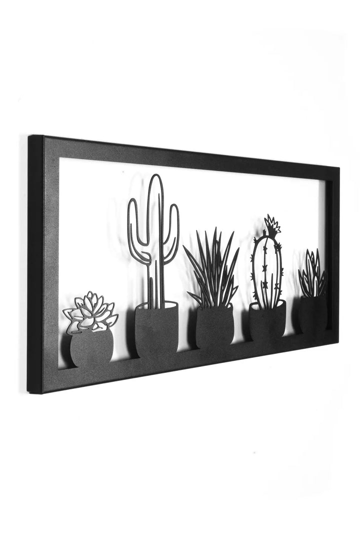 cMetall wall decor showing five types of cacti in a frame, cut with great detail and gives a 3D effect on the wall behind